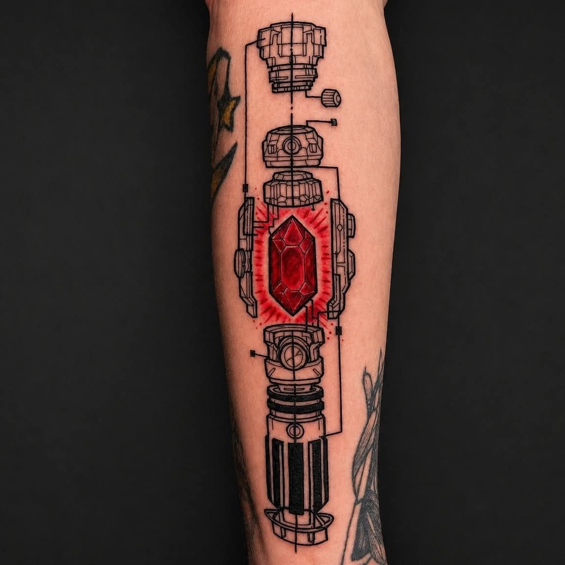 Lightsaber schematic blueprint tattoo by Emily Gauldreault