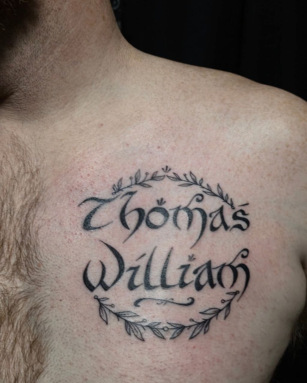 Gothic script memorial tattoo Thomas and William